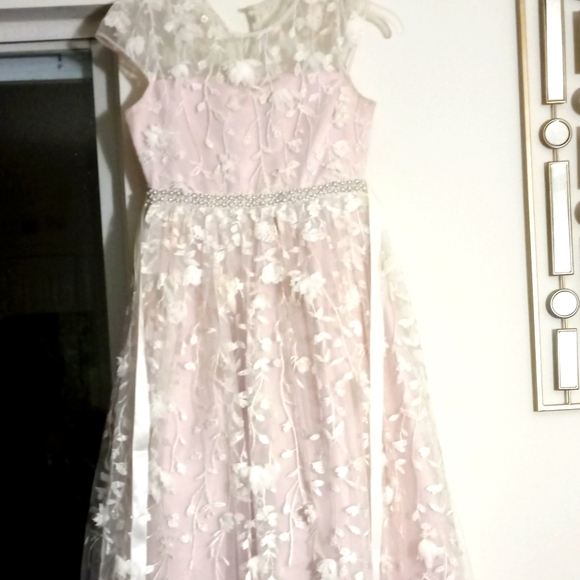 A formal cream colored dress